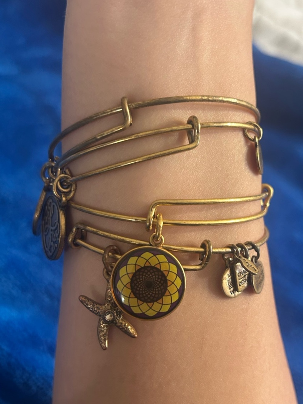 Alex and Ani Gold Charm Bracelet Set of 4 – Sunflower Starfish Lighthouse Logo